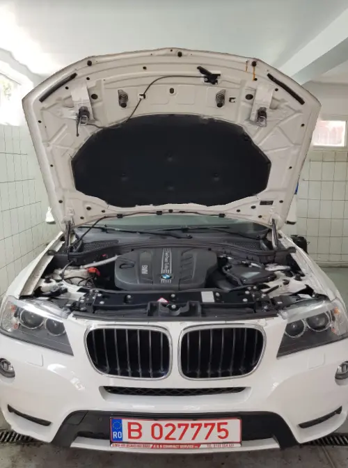 BMW with a hood opened